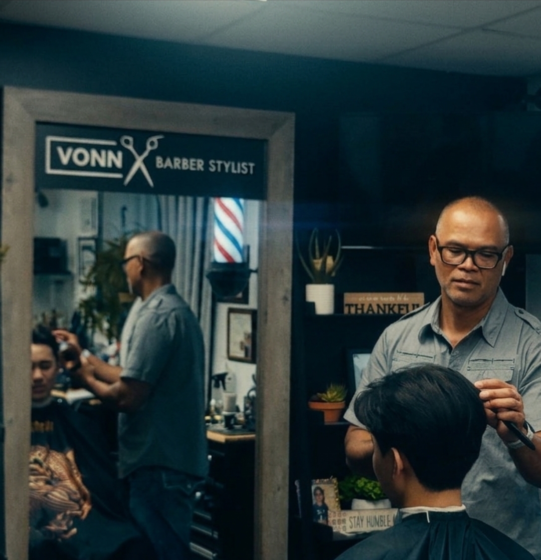 Vonn Barber Stylist — mirror reflection inside the Ottawa shop